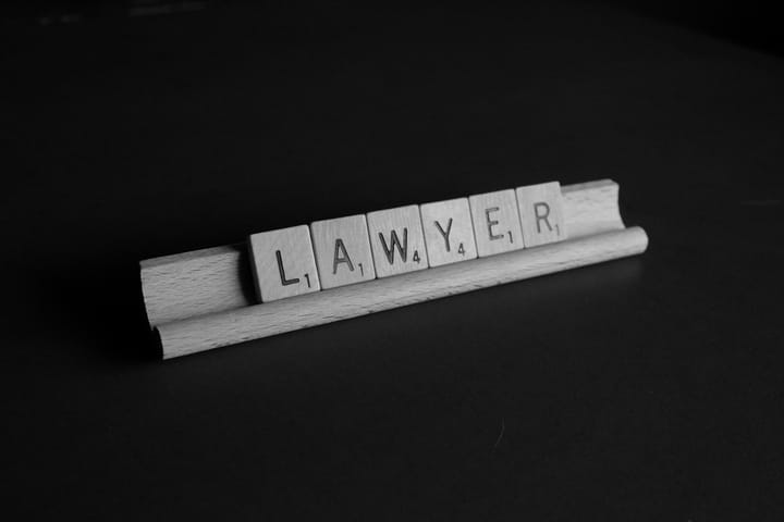 lawyer spelled out with scrabble tiles