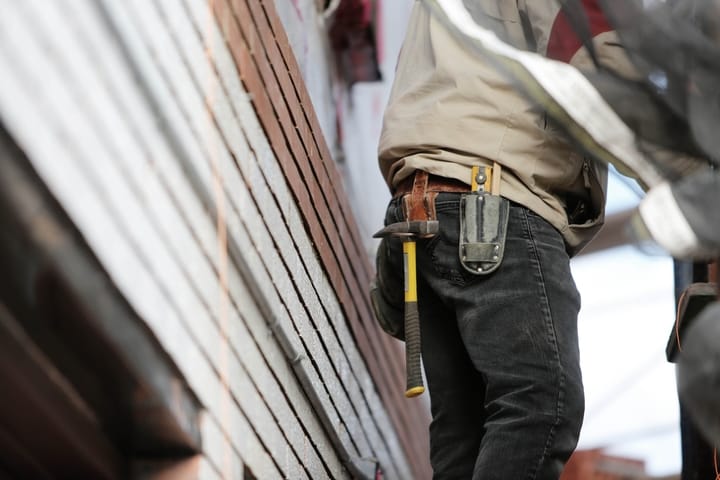 worker with toolbelt